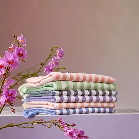 "Elegant bath towel displayed in natural light"